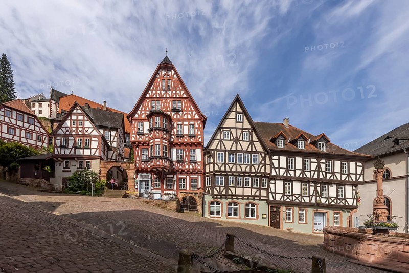 Miltenberg market square with market fountain and magnificent half-timbered houses, Schnatterloch. The ensemble is one of the most photographed motifs in Germany, postcard motif. Miltenberg, Lower Franconia, Bavaria, Germany, Europe