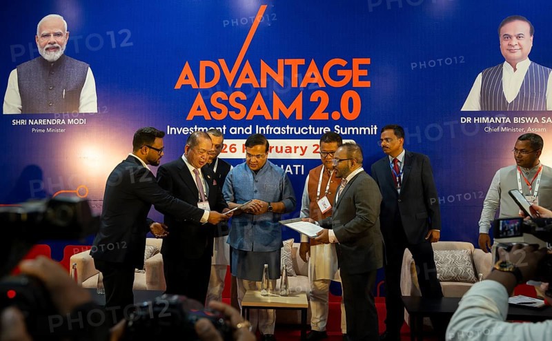 Assam Chief Minister Himanta Bishwa Sarma with investors on a MoU sign function during The Advantage Assam 2.0 Investment Summit in Guwahati, India on 25 February 2025