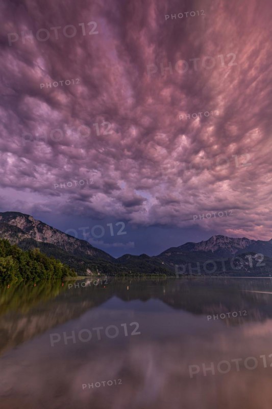 Stormy atmosphere, mountains reflected in lake, Lake Kochel, Alpine foothills, Bavaria, Germany, Europe