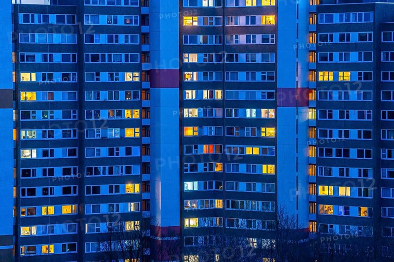 High-rise buildings in the Bensberg residential park, Bergisch-Gladbach, 18-storey housing estate with over 900 flats spread over 7 building complexes, dusk, illuminated windows, North Rhine-Westphalia, Germany, Europe