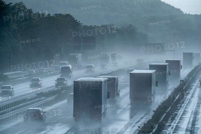A2 motorway, at Recklinghausen motorway junction, heavy traffic during a thunderstorm, North Rhine-Westphalia, Germany, Europe