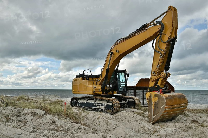 Excavators working to reclaim land on the beach of the Darß peninsula, Mecklenburg-Western Pomerania, Germany, Europe