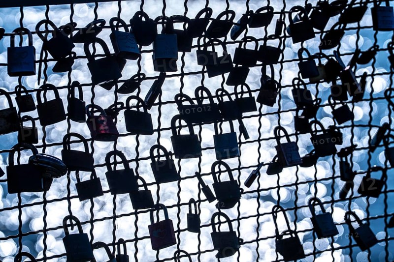 Padlocks, so-called love locks on a fence, vantage point in Wesel am Rhein, North Rhine-Westphalia, Germany, Europe