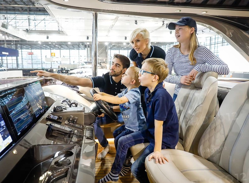 Messe boot Düsseldorf, Model family posing on the English Princess Yacht Rose Y85 on the occasion of a press event, Düsseldorf, North Rhine-Westphalia, Germany, Europe