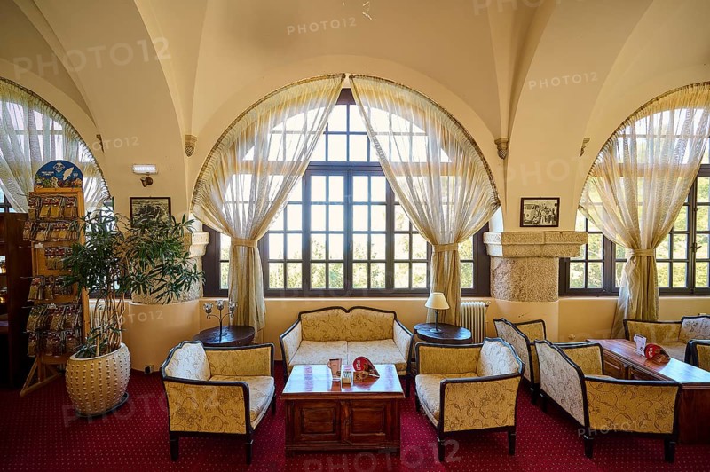 Cosy interior with large windows, curtains, seating areas and warm lighting, Elafos Hotel, Profitis Ilias, Rhodes, Dodecanese, Greek Islands, Greece, Europe