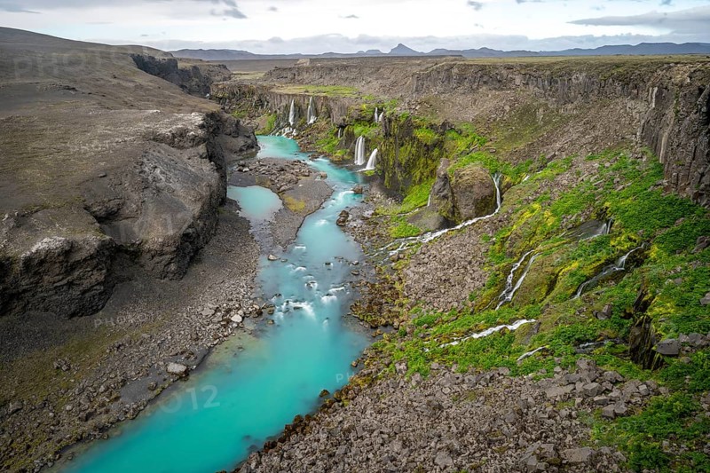 Waterfalls and a turquoise blue river flowing through a canyon, Sigöldugljúfur, long exposure, Icelandic highlands, Iceland, Europe