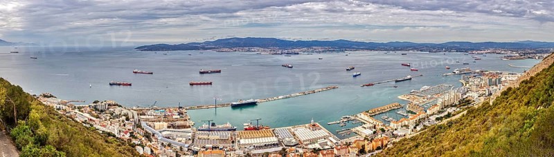 Overview of a harbour and cityscape by the sea, Gibraltar, Europe