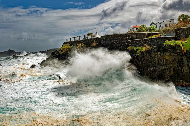 High waves on the rocks of Porto Moniz, surf on the Atlantic Ocean, storm, clouds, Porto Moniz, Madeira, Portugal, Europe