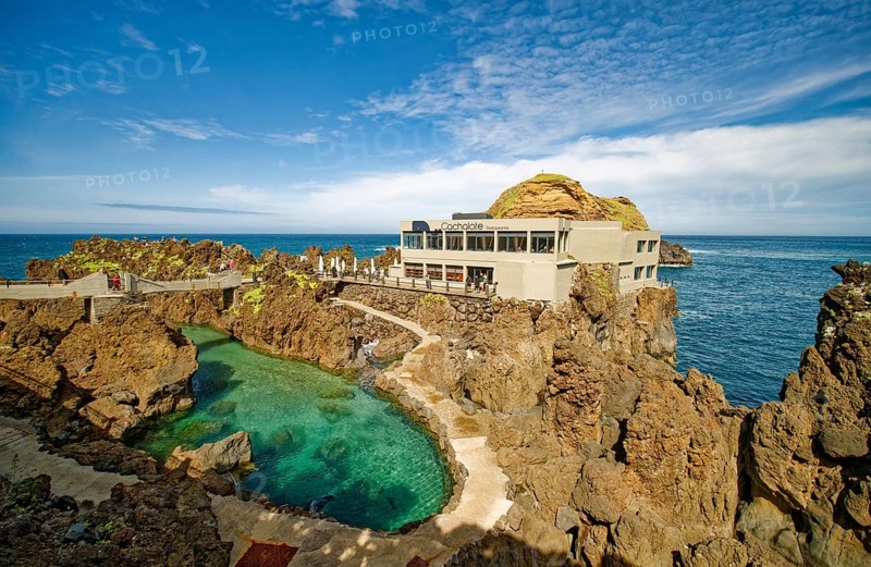 Natural swimming pools in volcanic rock, Cachalote restaurant, lava pools, natural swimming pools, natural pools, rocky coast, bathing complex, Porto Moniz, Madeira, Portugal, Europe