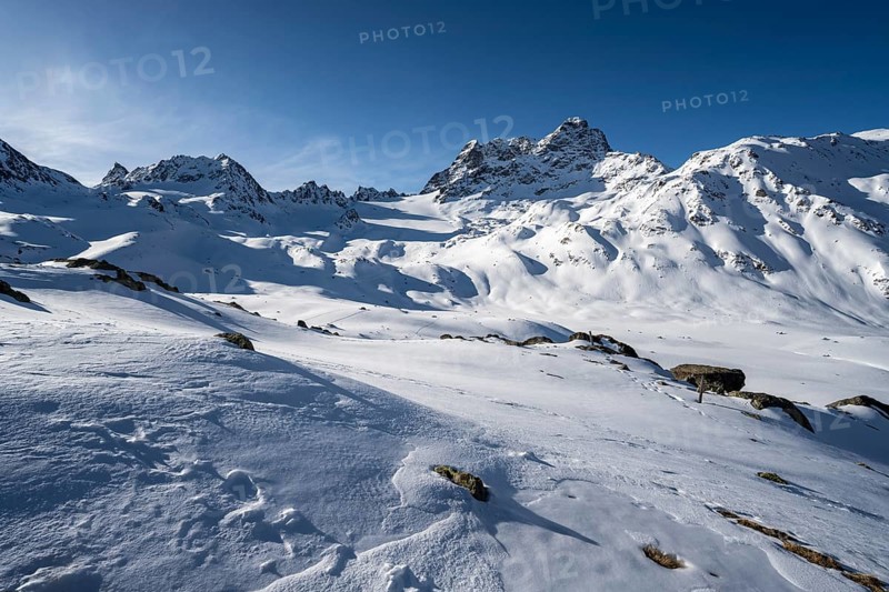 Mountain peak Piz Kesch with snow, view at the Kesch hut in winter, Grisons Haute Route, Albula Alps, Rhaetian Alps, Grisons, Eastern Switzerland, Switzerland, Europe