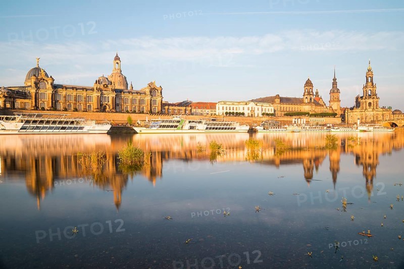 Silhouette of the Old Town with reflection in the Elbe in the morning, steamboats on the Terrassenufer, Brühl's Terrace, Academy of Fine Arts, dome of the Church of Our Lady, Sekundogenitur, Ständehaus, Georgentor, Hausmannsturm, Hofkirche and Augustusbrücke, Dresden, Saxony, Germany, Europe