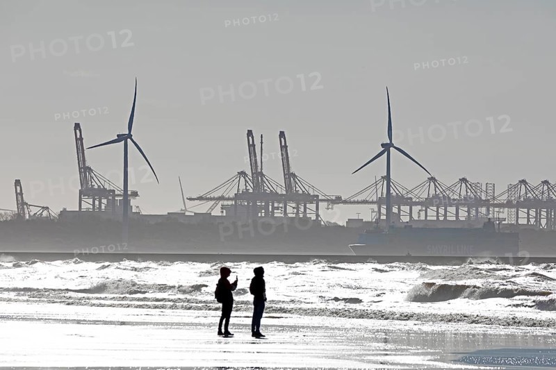 Silhouettes of wind turbines, harbour, people, beach, sea, Hoek van Holland, Rotterdam, Netherlands