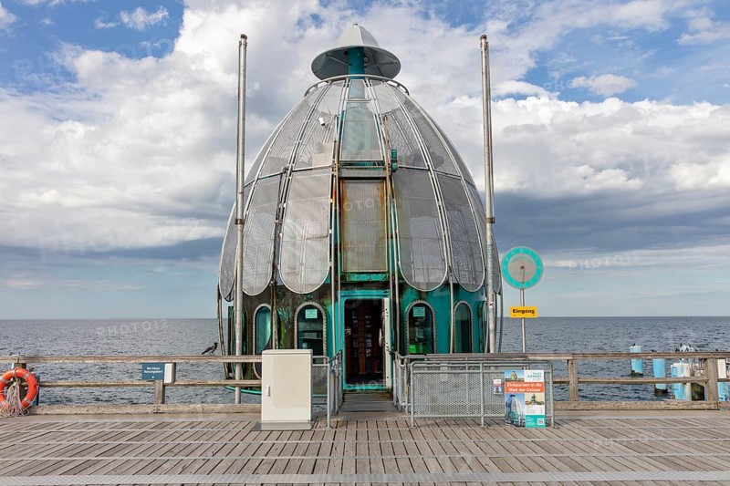 Metal pavilion at the end of a pier with sweeping sea views, Rügen