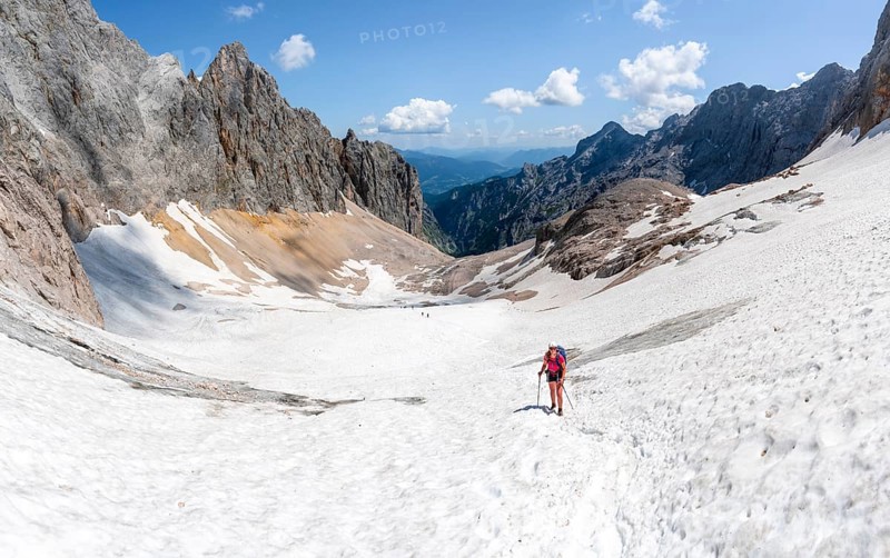 Mountaineer on a snowfield, mountain basin with glacier remnant of the Höllentalferner, Höllental, rocky mountain peaks, Höllental, Bavaria, Germany, Europe
