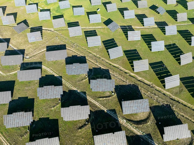 Rows of solar panels at a photovoltaic plant near town of Espejo. Aerial view. Drone shot. Córdoba province, Andalucía, Spain, Europe