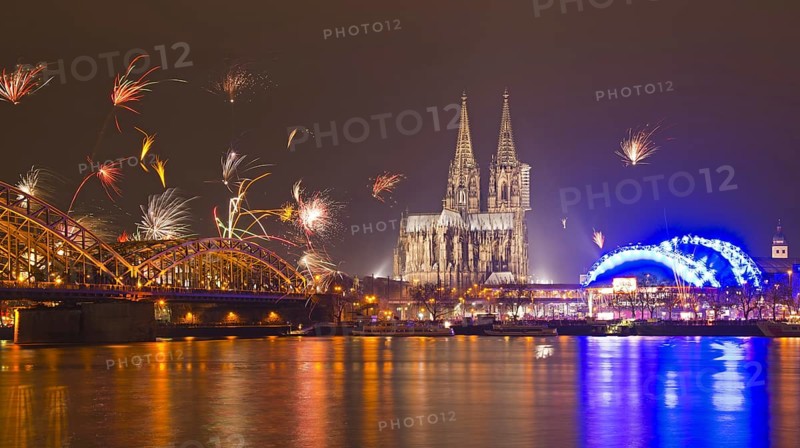 New Year's Eve fireworks, Hohenzollernbruecke with cathedral and Musical Dome, Rheinufer, Cologne, Rhineland, North Rhine-Westphalia, Germany, Europe