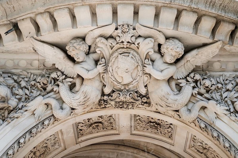 Figures of angels and elaborate floral relief work, Middle Temple Lane entrance, The Inns of Court, London, England, Great Britain