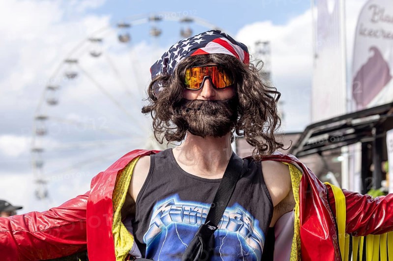 Adenau, Germany, 8 June 2024: Fans enjoy Rock am Ring Festival. The festival takes place at the Nürburgring race track near the town of Adenau from 7 to 9 June 2024, Europe