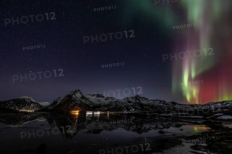 Northern lights over fjord, steep mountains, winter, aurora borealis, Flakstadoya, Lofoten, Norway, Europe