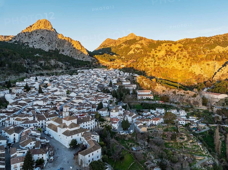 The White Town of Grazalema in the Sierra de Grazalema. Aerial view. Drone shot. Cádiz province, Andalusia, Spain, Europe