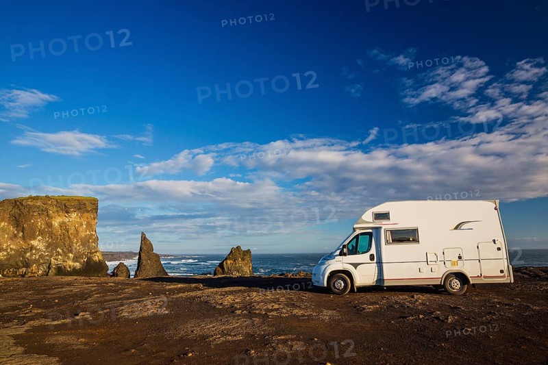 Motorhome parking on the shoreline, south of Sandvik with crashing waves. Rough nature