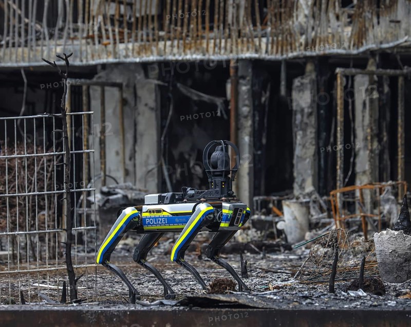 Essen, North Rhine-Westphalia, Germany, major fire in Essen's Weststadt district. The ruins of the apartment block in Bargmannstrasse are not allowed to be entered due to the risk of collapse. The 35-kilo robot dog HERBIE is therefore tasked with inspecting the inside of the building using a 360-degree camera, a thermal imaging camera and a laser scanner. The new building from 2015 had modern fire doors. The fire affected 39 flats with around 100 tenants, Europe