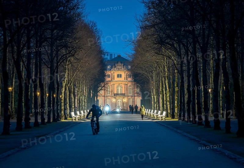 The light benches by artist Stefan Sous in the Hofgarten, entitled UV-A UV-B, 14 completely refurbished exhibits from the 2002 light-grey art exhibition, which now stand and light up as a permanent work of art on Jägerhofallee, LED technology, in the background Jägerhof Palace, home of the Goethe Museum, Düsseldorf, North Rhine-Westphalia, Germany, Europe
