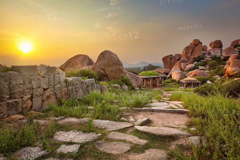 Ancient ruins in Hampi on sunset. Above Hampi Bazaar, Hampi, Karnataka, India, Asia