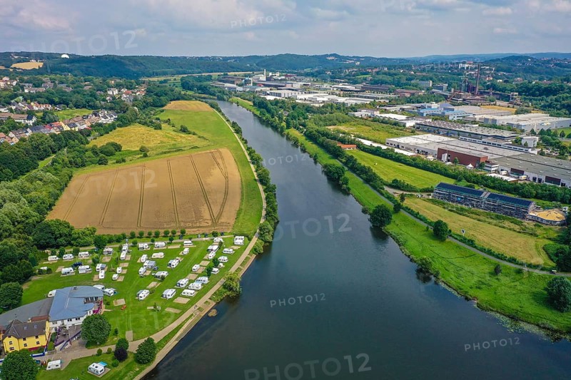 Hattingen, North Rhine-Westphalia, Germany - Cityscape on the Ruhr, Ruhr promenade, in front a camping site, behind the LWL Industrial Museum Henrichshütte Hattingen