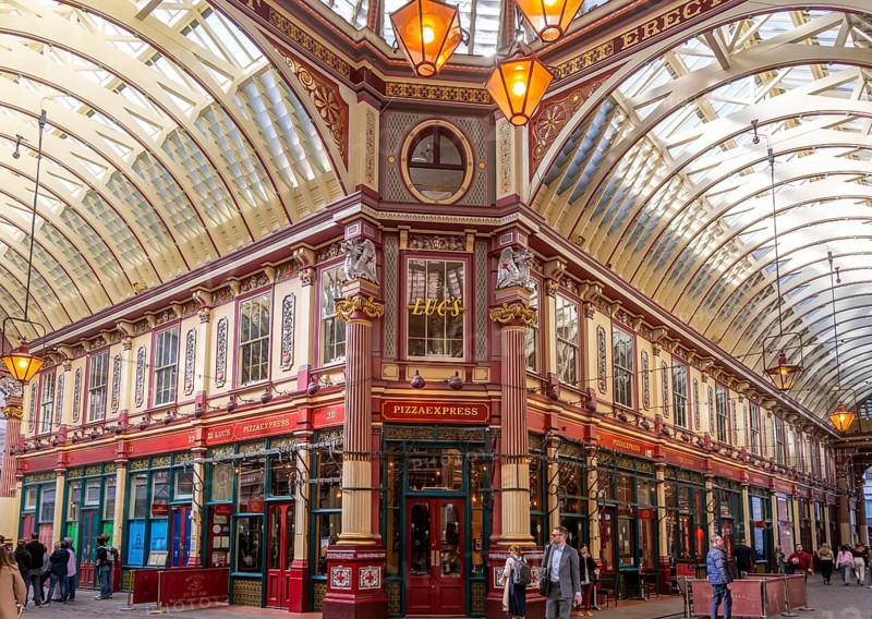 Historic covered shopping arcade Leadenhall Market, City of London, London, England, UK architect Sir Horace Jones 1881