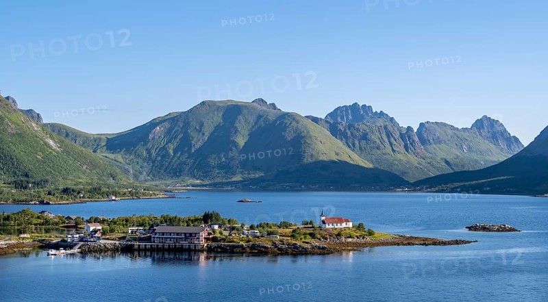 Place and small church Sildpollnes Kirke at the fjord Austnesfjorden, idyllic Norwegian fjord landscape, Sildpollen, Nordland, Norway, Europe