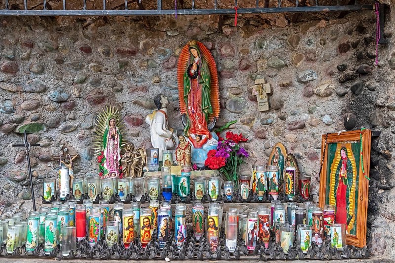 Chimayo, New Mexico, Prayer candles at El Santuario de Chimayo, a Roman Catholic pilgrimage shrine in the mountains of northern New Mexico