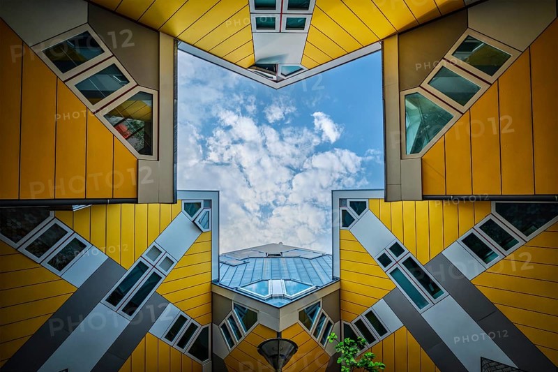 ROTTERDAM, NETHERLANDS, MAY 11, 2017: Cube houses, innovative cube-shaped houses designed by architect Piet Blom with idea to optimize space in Rotterdam, Netherlands now became a tourist attraction