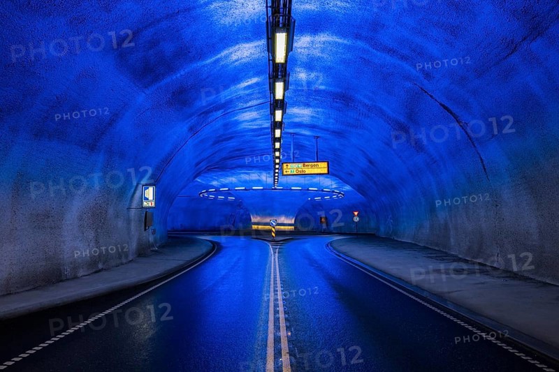 Blue illuminated roundabout in tunnel, Eidfjord, Hardangerfjord, Norway, Europe