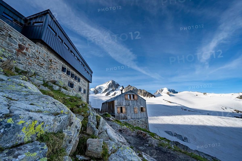 Old and new mountain hut Refuge Albert 1er, high alpine mountain landscape, summit of the Aiguille de Chardonnet and Glacier du Tour, glacier and mountain peaks, Chamonix, Haute-Savoie, France, Europe