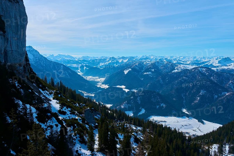 View of rugged mountains with snow and spruces, clear atmosphere, Steinplatte, Waidring, Tyrol, Austria, Europe