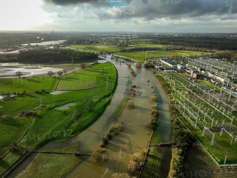 Wesel, North Rhine-Westphalia, Germany, flood on the Lippe, river in the Ruhr area, right Amprion substation Niederrhein, Europe