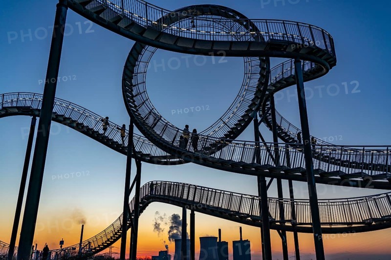 Landmark Angerpark Tiger & Turtle, Magic Mountain, walk-in sculpture in the form of a rollercoaster on the Heinrich-Hildebrand-Höhe spoil tip, HKM steelworks, sunset, Duisburg, North Rhine-Westphalia, Germany, Europe