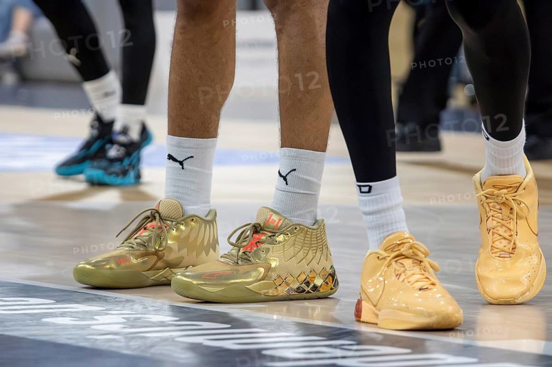 Basketball players wear the basketball shoes Nike LeBron 21 Melo Melo (2023) and MB.01 Golden Child by PUMA (2023)