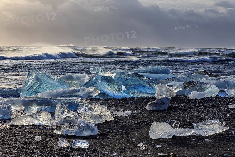 Ice floes on the beach, waves, sea, clouds, sunlight, winter, Diamond Beach, Breidamerkursandur, Jökulsarlon, Iceland, Europe