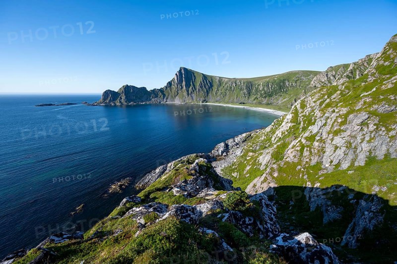View of coastal landscape, cliffs with peak Måtind, Høyvika beach and sea, hike to the peak of Måtind, Andøya island, Vesterålen, Nordland Norway
