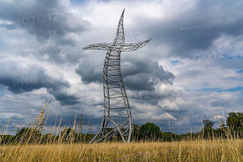 Emscherkunst, artwork Zauberlehrling by the Berlin artist group Inges Idee, an apparently dancing electricity pylon, 35 metres high, in a meadow near Haus Ripshorst in Oberhausen, North Rhine-Westphalia, Germany, Europe