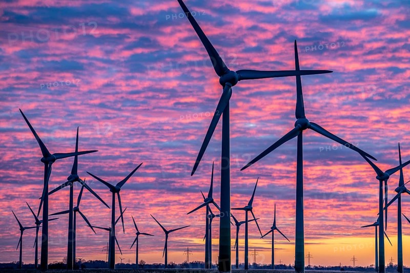 Wind farm near the East Frisian town of Norden, east of the town, sunset, Lower Saxony, Germany, Europe