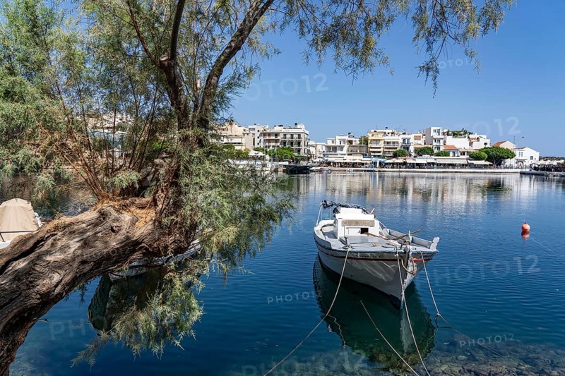The village of Agios Nikolaos, in the eastern part of Crete, view over Lake Voulismeni, connected to the sea, old town, Greece, Europe