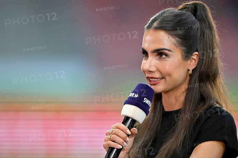 TV presenter Lea Wagner in an interview, microphone, logo, SWR, portrait, smiles, Voith-Arena, Heidenheim, Baden-Württemberg, Germany, Europe