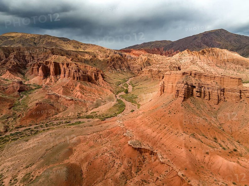 Eroded mountain landscape, canyon with red and orange rock formations, aerial view, Konorchek Canyon, Chuy, Kyrgyzstan, Asia