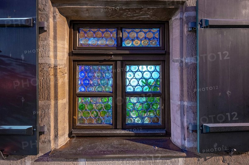 Old Franconian bull's-eye windows on a historic pub, Nuremberg, Middle Franconia, Bavaria, Germany, Europe