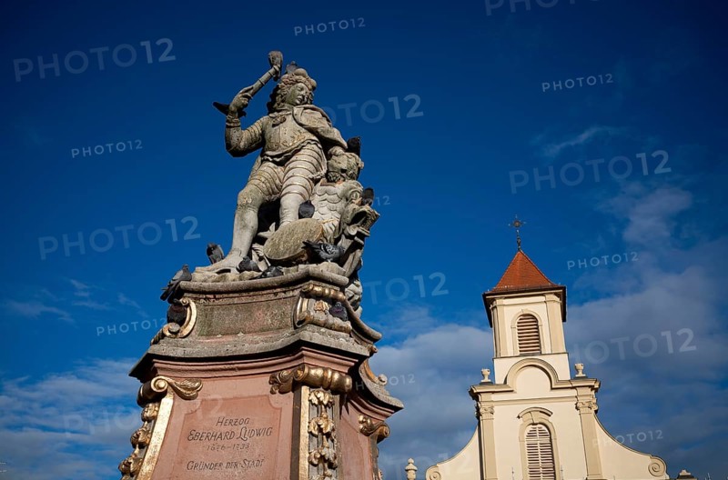 Duke Eberhard Ludwig Monument, behind it the Catholic Church of the Most Holy Trinity, Ludwigsburg, Baden-Württemberg, Germany, Europe