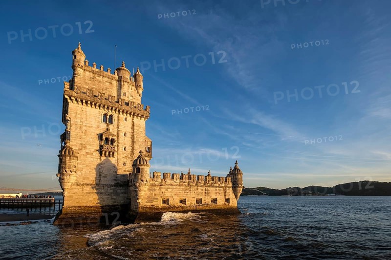 Belem Tower or Tower of St Vincent, famous tourist landmark of Lisboa and tourism attraction, on the bank of the Tagus River Tejo on sunset. Lisbon, Portugal, Europe