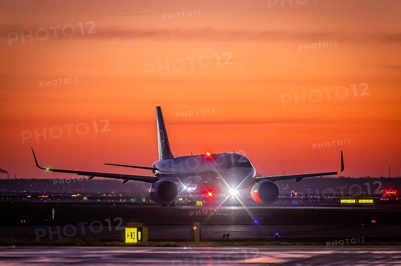 Early in the morning in front of sunrise at the airport, a Lufthansa aircraft stands ready for take-off on the runway, Fraport, Frankfurt am Main, Hesse, Germany, Europe